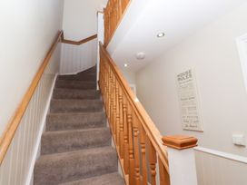 A staircase leading to an upper floor at Pippin in Lucker