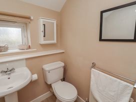 A bathroom with a sink and toilet at Ahoy in Seahouses