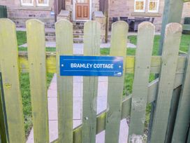 A gate with a sign at Bramley Cottage in Lucker