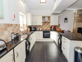 A kitchen with various appliances at Bramley in Lucker