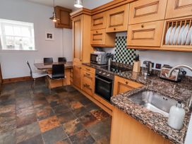 A kitchen with countertop and appliances at No9 Budle Sands in Bamburgh