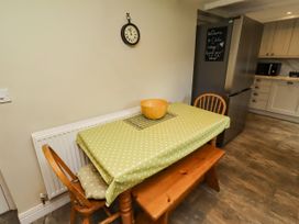 A table with a bowl in a kitchen at Coble Cottage in Craster
