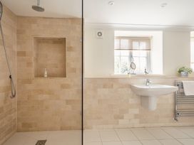 A bathroom with a shower and sink at Westhill House Warkworth