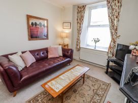 A living room with a sofa and television at Hardys House in Alnwick