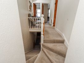 A staircase leading to a hallway at Hardys House in Alnwick