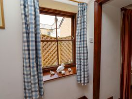 A window with decorative objects on the sill at Lavender Cottage (Bailiffgate) Alnwick