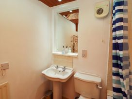 A bathroom with a sink and toilet at Lavender Cottage (Bailiffgate) Alnwick