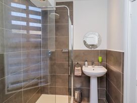 A bathroom with a shower and sink at Alnbank in Alnmouth