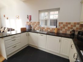 A kitchen with a sink and countertop at Roe Deer in Lucker