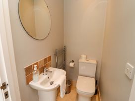 A bathroom with a sink and toilet at Pipistrelle in Bamburgh