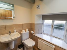 A bathroom with a sink and toilet at Millstone Lucker