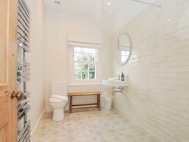 A bathroom with a sink and toilet at Mermaid Cottage in Port Isaac