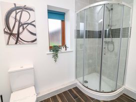 A bathroom with a shower and toilet at Lodge 7 in South Hykeham