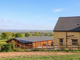 A house and cabin with a view of the countryside at Palace Studio St Weonards