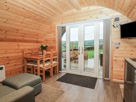 A dining area with table and chairs at Oak in Ulverston