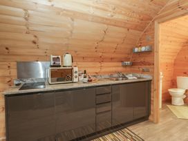 A kitchen with sink and appliances at Oak in Ulverston