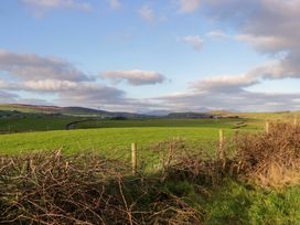 A landscape with green fields and hills at Oak in Ulverston