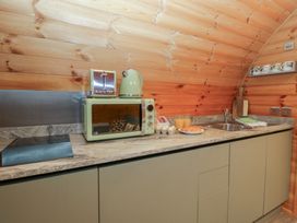 A kitchen with appliances and countertop at Rowan in Ulverston