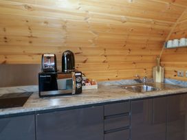 A kitchen with a toaster and coffee machine at Cherry in Ulverston