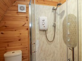 A bathroom with shower and toilet at Cherry in Ulverston