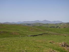 A landscape with grass and mountains at Cherry in Ulverston
