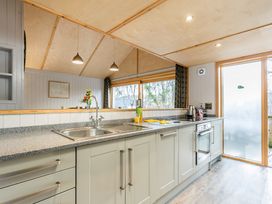 A kitchen with a sink and countertop at Lodge 17 in Corfe Castle