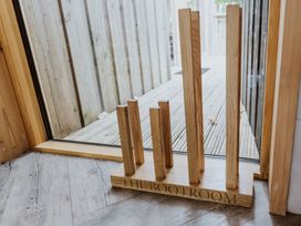 A boot rack by the door at Lodge 19 in Corfe Castle