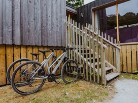 A staircase leading to a building with bicycles parked at Lodge 19 in Corfe Castle