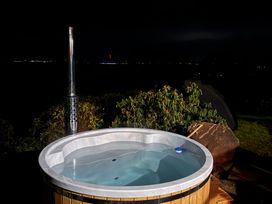 A hot tub with a chimney at Sibrwd Y Mor in Harlech