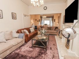 A living room with two sofas and a coffee table at The Causeway in Llandudno