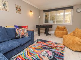 A snug with a foosball table and bean bags at The Causeway in Llandudno