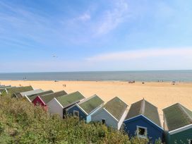 Beach huts overlooking the sea at Skylark Southwold