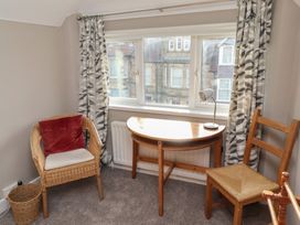 An office with a desk and chair at Rose House in Alnmouth