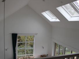 A living room with skylights and a window at Narracott Down in South Molton