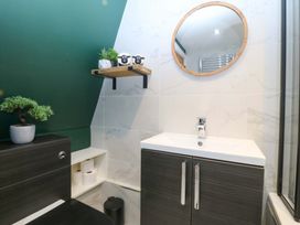 A bathroom with a sink and toilet at Old Chapel House Abergwyngregyn near Llanfairfechan