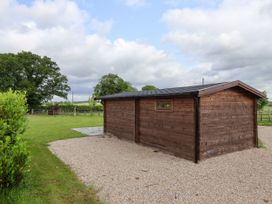 A wooden shed in an outdoor area at Lodge 2 in York