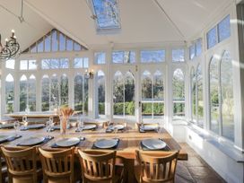 A dining room with a table and chairs at Valley View in Dalton-In-Furness