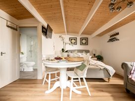 A studio room with a table and chairs at Hazel in Blandford Forum