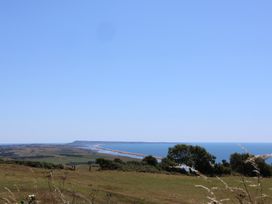 A view of the sea and land from a higher elevation at The Hideaway in Portesham