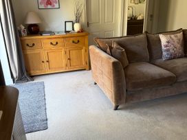 A living room with a sofa and drawer unit at The Annexe in Bridlington