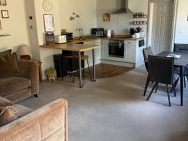 A living room with a kitchen area at The Annexe Bridlington