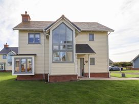 A house with windows and door in front yard at The Beach House (Beadnell) Beadnell