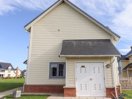 A house exterior with a door and window at The Beach House (Beadnell) Beadnell