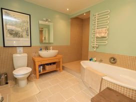 A bathroom with a sink, toilet, and bathtub at Hart Head Farm in Rydal near Ambleside