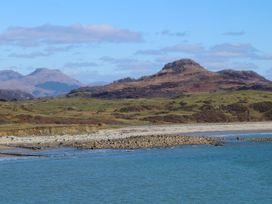 A view of shoreline and hills at Bryn Caled in Llanarmon near Y Ffor