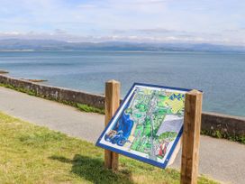 A map sign along a path by the sea at Bryn Caled Llanarmon near Y Ffor