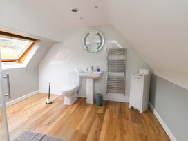 A bathroom with a sink and toilet at Belan Wen in Llanddona near Pentraeth