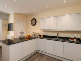 A kitchen with a sink and countertop at Hazelgarth House in Hunmanby