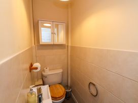 A bathroom with a toilet and sink at Hazelgarth House in Hunmanby