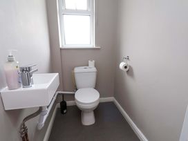 A bathroom with a sink and toilet at Hazelgarth House in Hunmanby